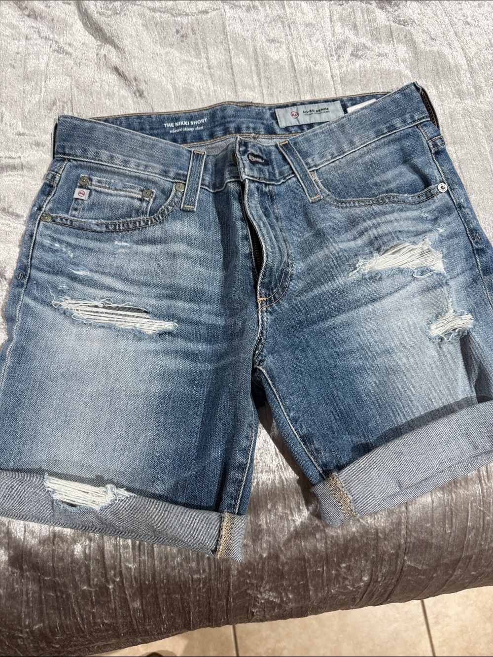 Agolde Faded Blue Distressed women’s Jean Shorts